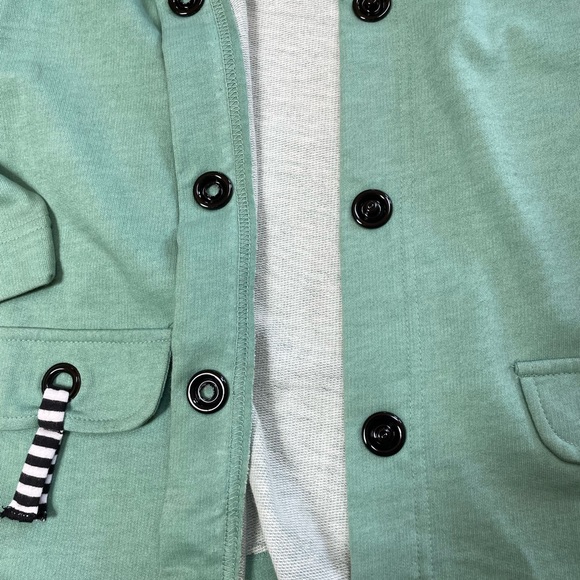 Good Fortune brand green jacket. Navy stripe details. Snap front. Size Small - Picture 4 of 8